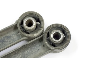 Damaged rear trailing arm bushing.
