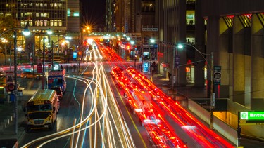 Toronto traffic on Queen Street West during night time