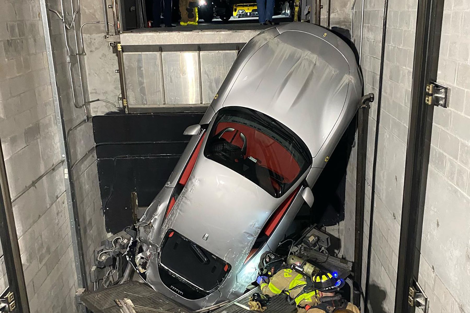 New Ferrari Roma Tumbles Down Dealership S Car Elevator Driving