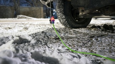 Extension cord plugged into block heater in winter