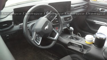 A spy shot of the 2024 Ford Mustang's interior in base trim