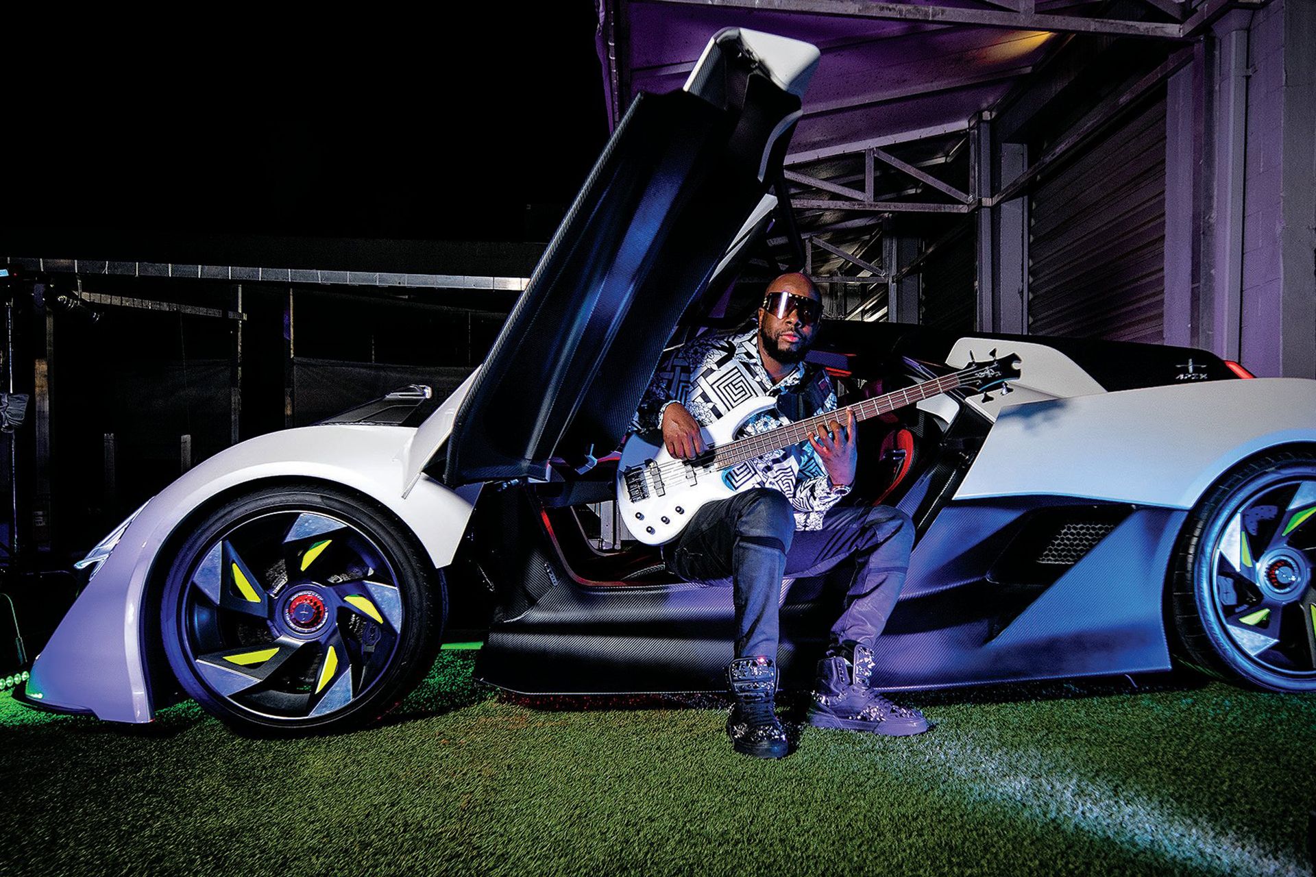 Watch Wyclef Jean raps about his new EV supercar company Driving