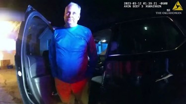 A screenshot from a video of an Oklahoma police officer's body-cam, as he arrests his department captain