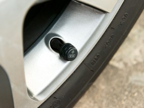 Valve stem on a wheel with a modern Tire Pressure Monitoring Sensor installed