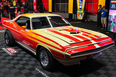 The 1970 Plymouth 'Cuda Rapid Transit System Caravan custom show car crossing the auction block at Mecum in May 2023