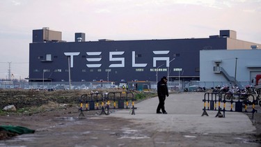 A Tesla sign is seen on the Shanghai Gigafactory of the U.S. electric car maker before a delivery ceremony in Shanghai, China January 7, 2020