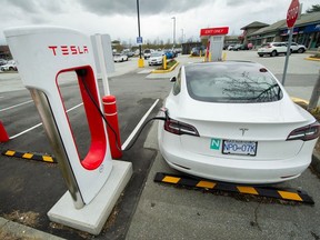 Tesla EV stations at a mall parking lot at No. 5 Road and Steveston Highway in Richmond.