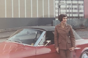 Teenage Carol Mills with Ford Mustang