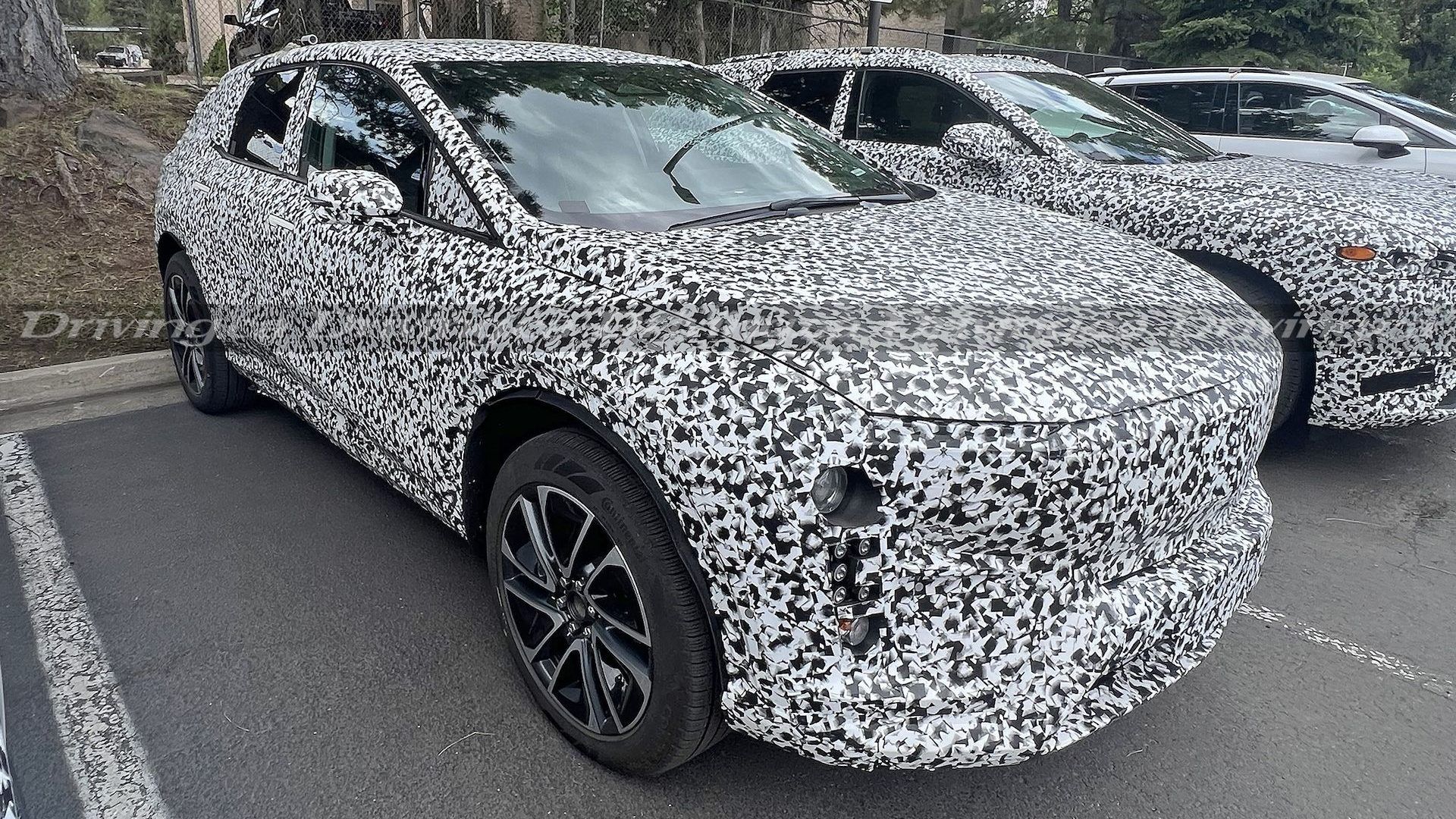 Cadillac s new XT4 sized EV spied alongside Honda Prologue Driving
