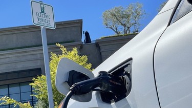 An electric car charges via Chargepoint charger at a mall parking lot on June 27, 2022 in Corte Madera, California
