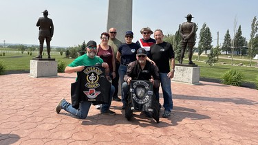 Raising money for the Military Police Fund for Blind Children, Shawn Dunnett, left, led a group of riders to the Fallen Four Memorial Park in Mayerthorpe, Alta. This was a mini-ride, an event held as part of the Military Police National Motorcycle Relay, set to start on July 1 in Victoria.