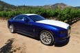 The all-electric Rolls-Royce Spectre is an all-wheel drive two-door, fastback coupe that seats four. Despite that coupe designation, the automaker's first-ever EV is nearly 10 centimetres longer than the new Cadillac Escalade.