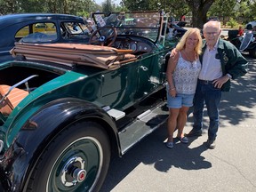 Gordie Thomas with daughter Terese beside the 1924 Packard roadster he bought when he was 16 years old.