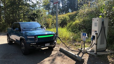The Rivian R1T getting the best charge of the trip, at no cost too boot, at an ABB fast-charger at a rest area in Little Fort, B.C.