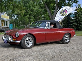 Terry MacFarlane of Vancouver Island arrives at the MG2023 car show held at Heritage Park as part of the North American MGB Register’s annual convention. His 1969 MGB has been on several long-distance touring trips, and last year he drove it to Peterborough, Ontario.