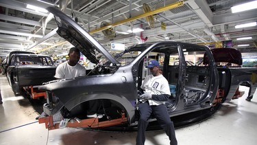 A Ram 1500 truck goes through the assembly line at the Warren Truck Assembly Plant September 25, 2014 in Warren, Michigan