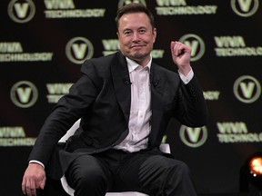 SpaceX, Twitter and electric car maker Tesla CEO Elon Musk reacts as he speaks during his visit at the Vivatech technology startups and innovation fair at the Porte de Versailles exhibition center in Paris, on June 16, 2023