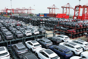 In this photo taken on September 11, 2023, BYD electric cars waiting to be loaded on a ship are stacked at the international container terminal of Taicang Port at Suzhou Port, in China's eastern Jiangsu Province