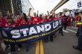 UAW President Shawn Fain marches with UAW members through downtown Detroit after a rally in support of the United Auto Workers members as they strike the Big Three auto makers on September 15, 2023 in Detroit, Michigan