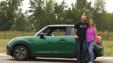 Kerry and Steve Lockhart pose with the one millionth Mini 3 door sold globally.