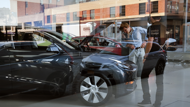 Tesla vehicles are displayed in a Manhattan dealership on September 8, 2020 in New York City