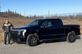 Calgary driver Chris Braun with the 2023 Ford F-150 Lightning. Driving the all-electric truck was his first experience with an EV, and he says it was an ‘eye-opener.’