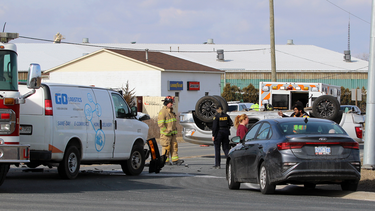 The driver of a silver Ram 1500 was uninjured, despite the truck ending up on its roof after crashing into a delivery van in Sarnia, Ontario in February 2023