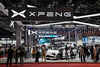 People visit the Xpeng booth during the 20th Shanghai International Automobile Industry Exhibition in Shanghai on April 19, 2023