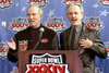 U.S. comedians Tom (left) and his brother Dick (right) Smothers address a press conference, January 28, 2000, at the Georgia Dome in Atlanta, Georgia