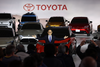 Toyota president Akio Toyoda gestures at a briefing on EV (electric vehicle) battery strategies at the company's showroom in Tokyo on December 14, 2021