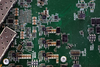 This photograph shows a close-up of microprocessors and semiconductors on a stand at the Mobile World Congress (MWC), the telecom industry’s biggest annual gathering, in Barcelona on February 27, 2023