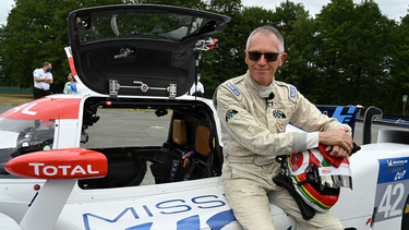 Carlos Tavares, then CEO and chairman of French carmaker PSA Group, poses after the presentation of the LMPH2G, a MissionH24 electric hydrogen racing prototype car, at the Montlhery motor racing circuit on July 24, 2020, in Linas