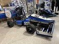 The University of Toronto Formula Racing team's UT24 car (foreground) for 2024; and last year's UT23 car (background)