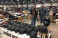 Manning the Turple Bros. Motorcycles booth at the Red Deer vintage motorcycle swap meet are Glen Wilde (left) and Troy Dezall. Now hosted by the Canadian Vintage Motorcycle Group’s Central Alberta section, this year’s event on March 24 is their 50th swap meet.