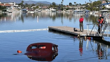 A 1939 Packard that'd rolled into a reservoir in Canyon Lake, California in April 2024