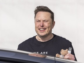 The CEO of Tesla, Elon Musk, gets in a car as he leaves the Tesla Gigafactory on March 13, 2024 near Gruenheide, Germany