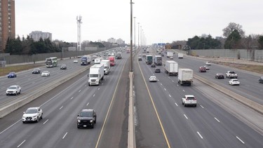 Traffic uses 401 Highway in Toronto on Wednesday, January 3, 2024.