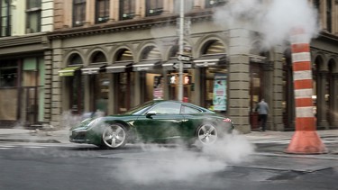 A 2017 Porsche 911 – the one millionth example ever built – rolls through downtown New York City