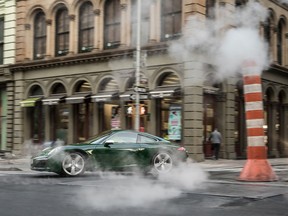 A 2017 Porsche 911 – the one millionth example ever built – rolls through downtown New York City