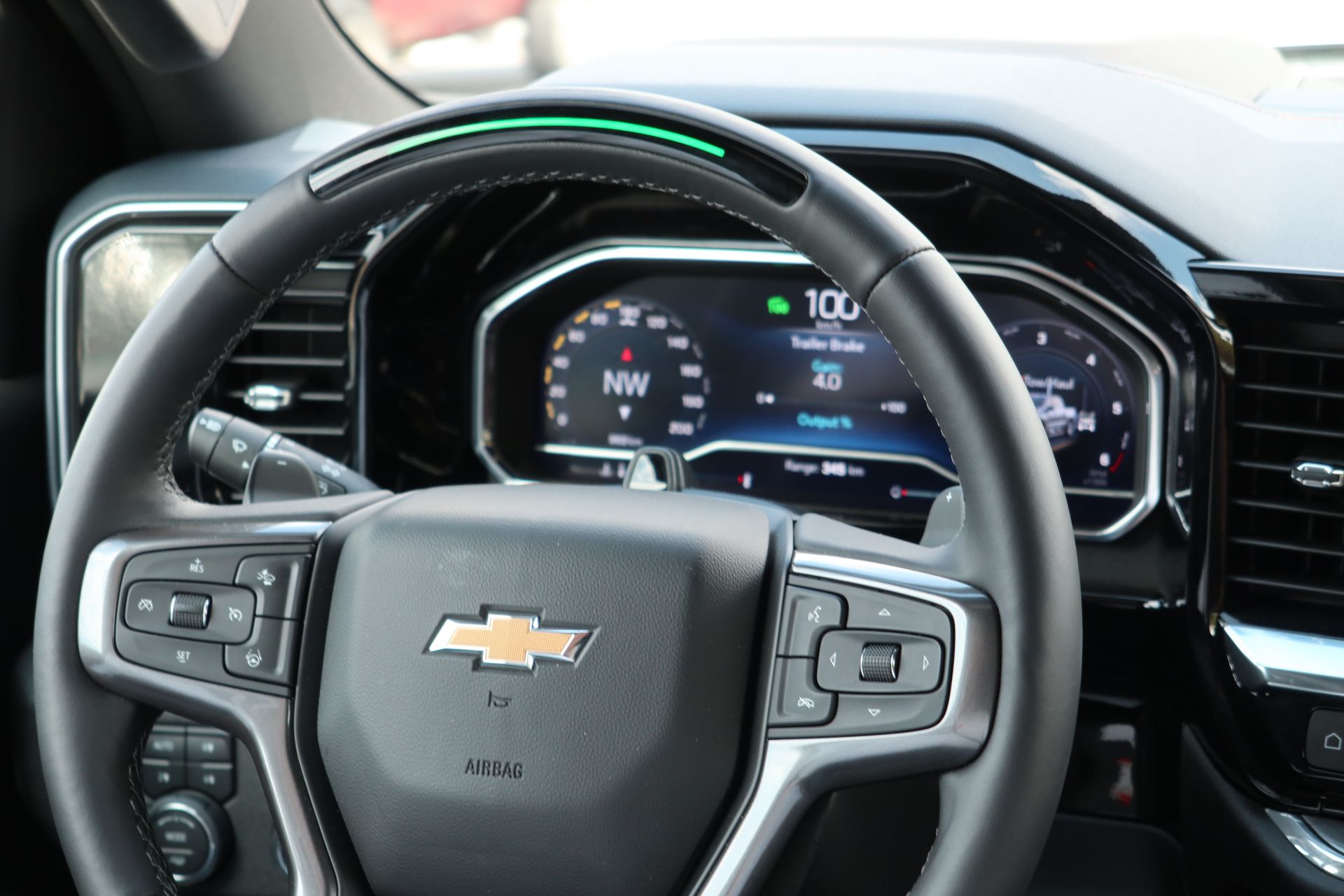 The Super Cruise hands-free driving assist is active when the steering wheel light turns green