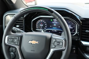 The Super Cruise hands-free driving assist is active when the steering wheel light turns green