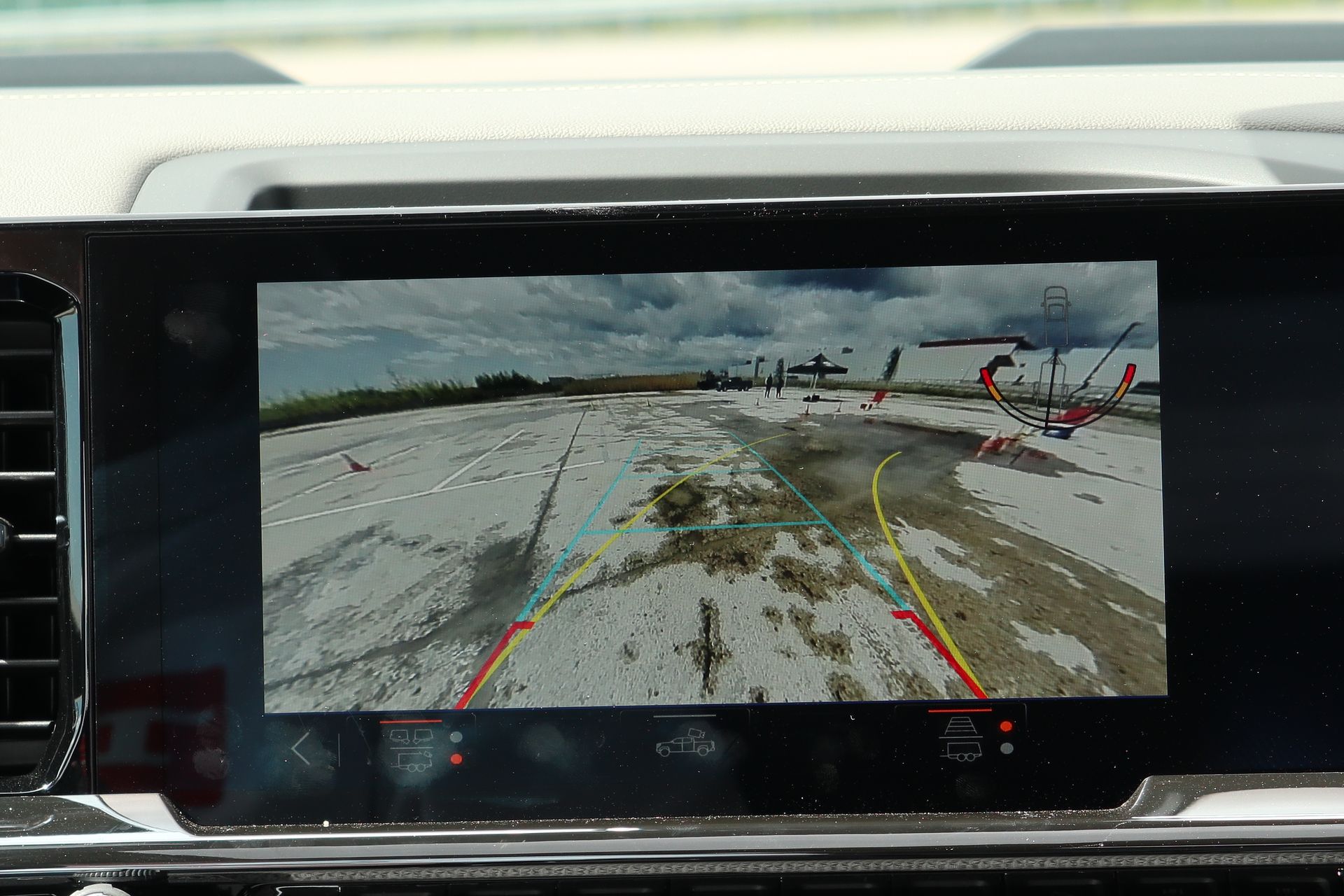 Reverse guidance lines and a trailer angle indicator help with backing up a trailer