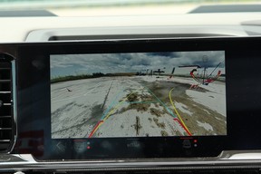 Reverse guidance lines and a trailer angle indicator help with backing up a trailer