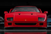 A 1990 Ferrari F40 – flanked by a Bugatti Veyron, left; and a Mercedes-Benz 300 SL roadster – from the 'Dare to Dream' Collection of Miles Nadal, in Toronto