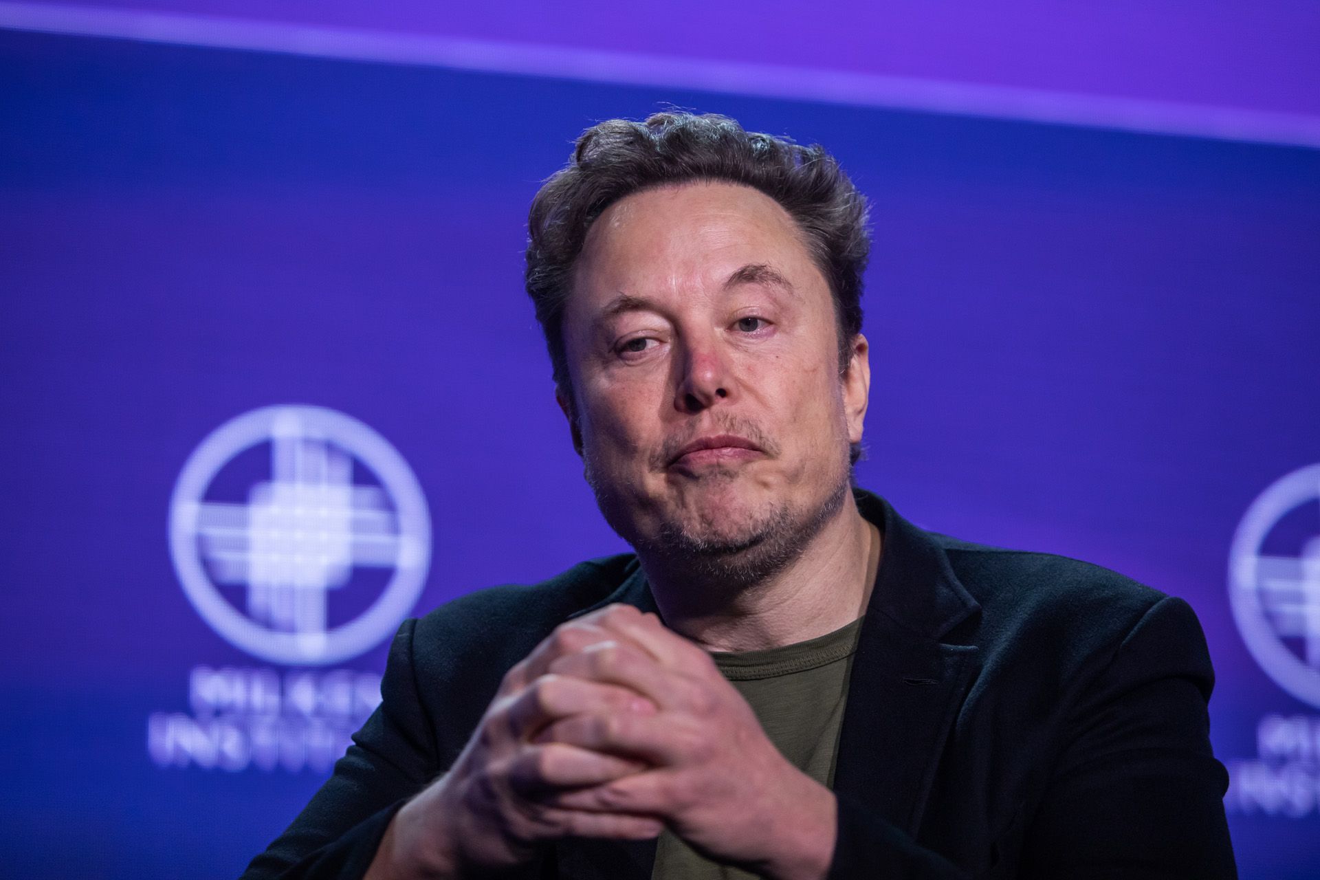 does-elon-musk-even-want-to-build-cars-anymore-david-booth-driving