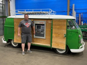 Lewis Thaw with his 1965 Volkswagen van that doubles as an ATM.