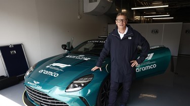 Bernd Mayländer with the 2024 Aston Martin Vantage safety car in the FIA pit garage during the 2024 Canadian Grand Prix in Montreal.