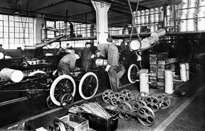Ford's integrated moving assembly line in Highland Park, Michigan in 1913