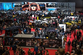 Visitors are seen during the first public day of the Geneva International Motor Show in Geneva, on February 28, 2024