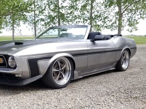 This 1971 Mustang convertible was a rusted out wreck when purchased by Lyle Vass more than 20 years ago. With his metal fabricating skills, Vass completely transformed the Mustang. It is in raw metal, and he drives it every summer as a rolling business card.